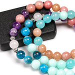 Load image into Gallery viewer, Awakening by Lotus Flower 108 Beads Mala zoomed on multiple stones beads seen from front
