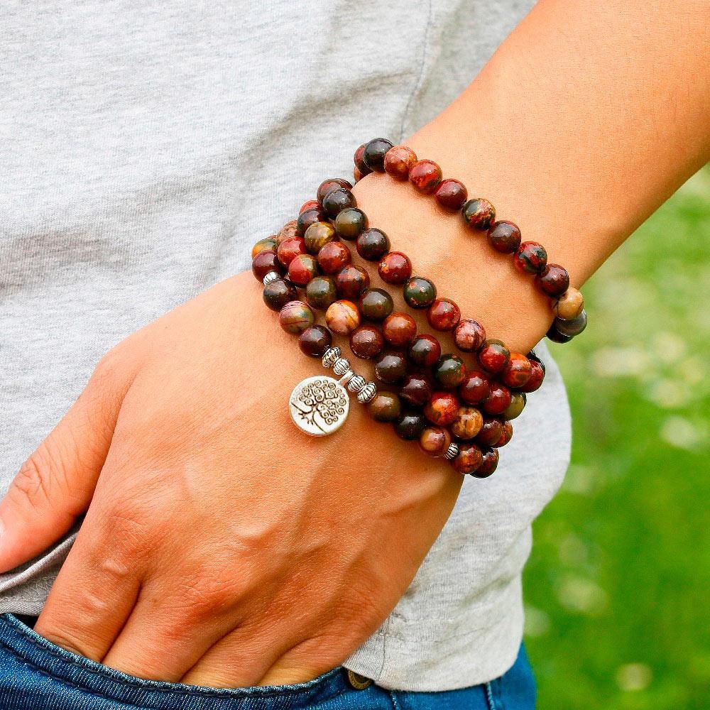 Clarity of Mind of Life Tree 108 Beads Mala wear as bracelet on man model in garden