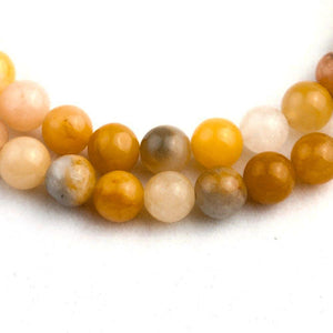 Essence of Life 108 Beads Mala zoomed on natural topaz stones beads seen from top