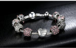 Load image into Gallery viewer, Inclusiveness of True Love Charm Bracelet in decorated environment with seen from front
