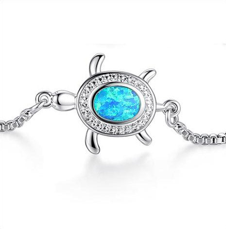 Precious Awareness of the Blind Sea Turtle zoomed on sea turtle incrusted with natural blue opal stone